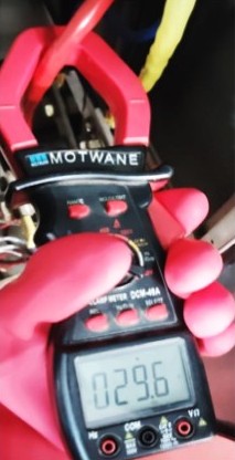 Digital Multimeter measuring Running Amperage of a Three Phase Induction Motor